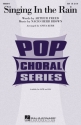 Singing in the Rain for female chorus, piano accompaniment, guitar, bass and drums ad lib vocal score (en)