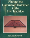 Playing hammered dulcimer